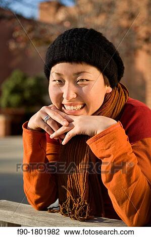 Stock Image - Asian woman model outdoors. Fotosearch