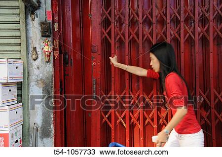 Asian Women close a Shop in Bangkok View Large Photo Image Stock Image - Asian Women close a Shop in Bangkok. Fotosearch