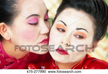 Asian women in traditional make-up kiss View Large Photo Image Stock Image - Asian women in traditional make-up kiss. Fotosearch
