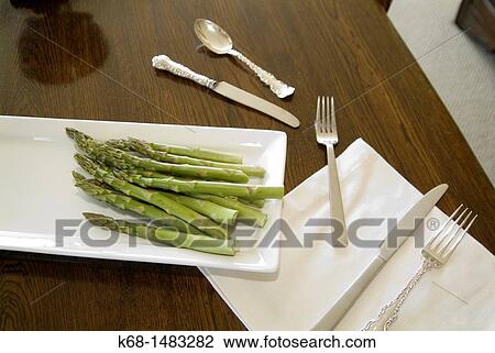 Asparagus on a white plate View Large Photo Image Stock Image - Asparagus on a white plate. Fotosearch
