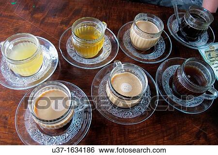 Assorted coffee ready for tourists to taste at Bedugul coffee plantation, Bali View Large Photo Image Stock Photograph - Assorted coffee ready for tourists to taste at Bedugul coffee plantation, Bali. Fotosearch