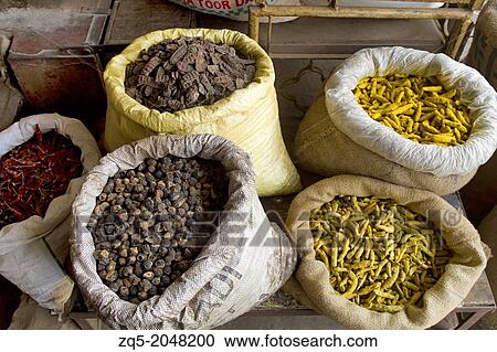 Stock Image - Assorted whole spices close up, Maharshtra, India. Fotosearch