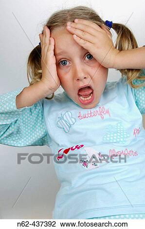 Stock Image - Astonished blond child.. Fotosearch