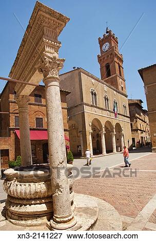 At left travertine Well in square Pio II, Piazza Pio II, on background Palazzo Comunale, town hall, Corso il Rossellino street, Pienza, Val dOrcia, or Valdorcia, Siena Province, Tuscany, Italy, Europe. View Large Photo Image Stock Photo - At left travertine Well in square Pio II, Piazza Pio II, on background Palazzo Comunale, town hall, Corso il Rossellino street, Pienza, Val dOrcia, or Valdorcia, Siena Province, Tuscany, Italy, Europe.. Fotosearch
