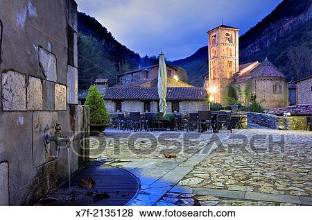 At right Romanesque church of Sant Crist? fol (s. XII), Beget. Garrotxa, Girona, Catalonia, Spain. View Large Photo Image Stock Photo - At right Romanesque church of Sant Crist? fol (s. XII), Beget. Garrotxa, Girona, Catalonia, Spain.. Fotosearch