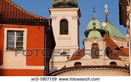 At right Saint Saviour Church, is one of the most precious early Baroque monuments in Prague This former main Jesuit church in Bohemia forms the south-west corner of Clementinum, Karlova street, Prague, Czech Republic, Europe. View Large Photo Image Stock Photo - At right Saint Saviour Church, is one of the most precious early Baroque monuments in Prague This former main Jesuit church in Bohemia forms the south-west corner of Clementinum, Karlova street, Prague, Czech Republic, Europe.. Fotosearch