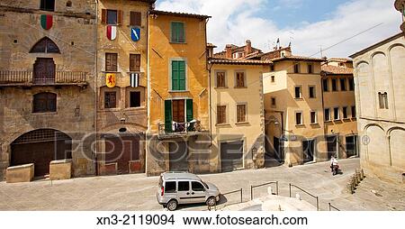 At right Santa Maria della Pieve church, Piazza Grande, Big Square, medieval square, Arezzo, Tuscany, Italy, Europe. View Large Photo Image Picture - At right Santa Maria della Pieve church, Piazza Grande, Big Square, medieval square, Arezzo, Tuscany, Italy, Europe.. Fotosearch