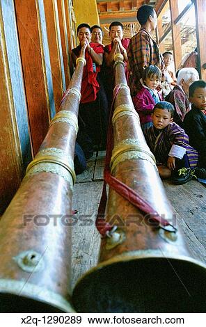 At the Wangdi Tsechu in Bhutan traditional horns are blown by young boys View Large Photo Image Stock Photo - At the Wangdi Tsechu in Bhutan traditional horns are blown by young boys. Fotosearch