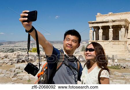 Athens Greece at the Acropolis Chinese tourists taking picture of the 6 Ladies at the Erechtelon building with ruins 14. View Large Photo Image Stock Image - Athens Greece at the Acropolis Chinese tourists taking picture of the 6 Ladies at the Erechtelon building with ruins 14.. Fotosearch