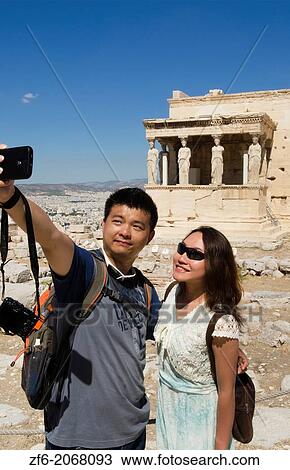 Athens Greece at the Acropolis Chinese tourists taking picture of the 6 Ladies at the Erechtelon building with ruins 14. View Large Photo Image Stock Image - Athens Greece at the Acropolis Chinese tourists taking picture of the 6 Ladies at the Erechtelon building with ruins 14.. Fotosearch