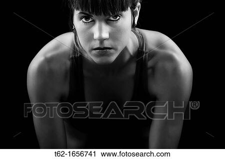 Athletic young woman, aggressive looking View Large Photo Image Stock Image - Athletic young woman, aggressive looking. Fotosearch