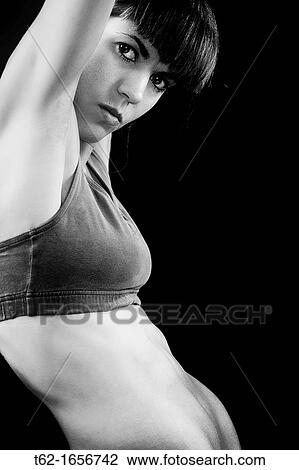 Athletic young woman, aggressive looking View Large Photo Image Stock Image - Athletic young woman, aggressive looking. Fotosearch