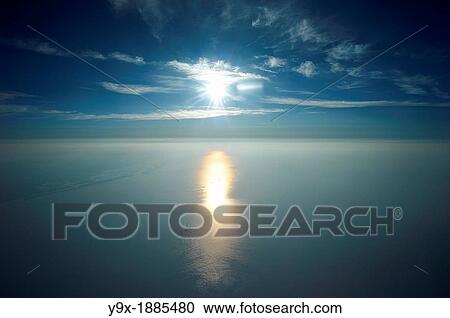 Atmospheric clouds and sunset over the ocean View Large Photo Image Stock Image - Atmospheric clouds and sunset over the ocean. Fotosearch