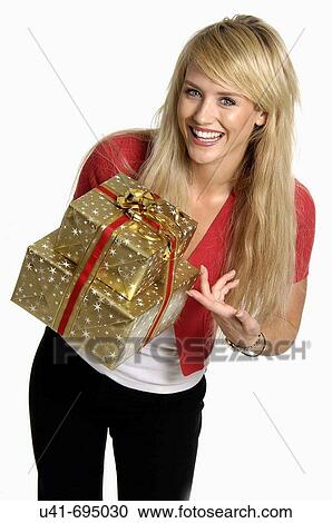 Attractive Blonde female with presents View Large Photo Image Stock Image - Attractive Blonde female with presents. Fotosearch