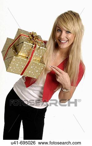 Stock Photograph - Attractive Blonde female with presents. Fotosearch