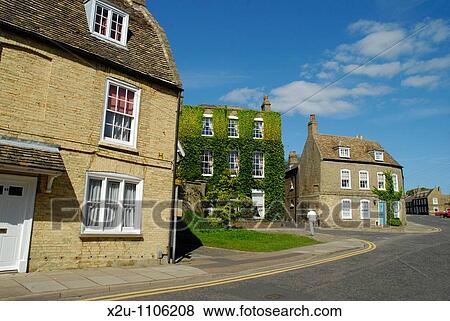 Stock Photo - Attractive riverside houses, Quayside, Ely, Cambridgeshire, England. Fotosearch