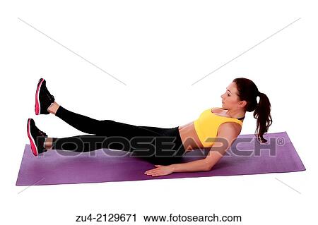 Attractive slim female model exercising. View Large Photo Image Stock Image - Attractive slim female model exercising.. Fotosearch
