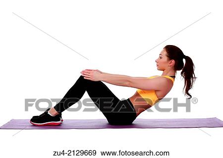 Attractive slim female model exercising. View Large Photo Image Stock Photo - Attractive slim female model exercising.. Fotosearch
