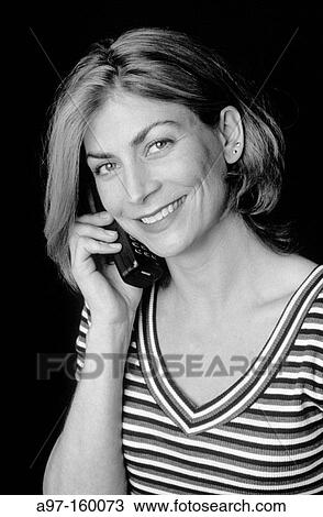 Attractive woman on telephone View Large Photo Image Stock Image - Attractive woman on telephone. Fotosearch
