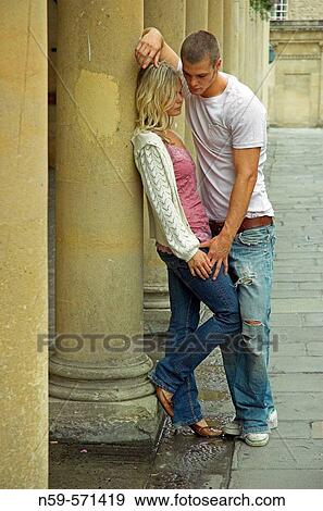 Attractive young couple physically close but struggling to communicate. View Large Photo Image Stock Photo - Attractive young couple physically close but struggling to communicate.. Fotosearch