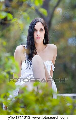 Attractive young woman, detached dress strap View Large Photo Image Stock Image - Attractive young woman, detached dress strap. Fotosearch
