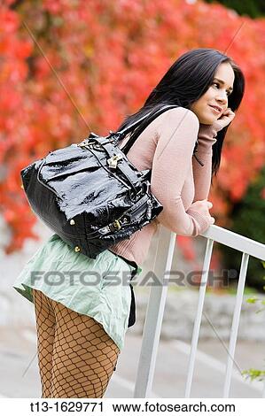 Attractive young woman in Autumn View Large Photo Image Stock Image - Attractive young woman in Autumn. Fotosearch