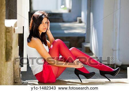 Attractive young woman in Red pantyhose and very high heels View Large Photo Image Stock Image - Attractive young woman in Red pantyhose and very high heels. Fotosearch