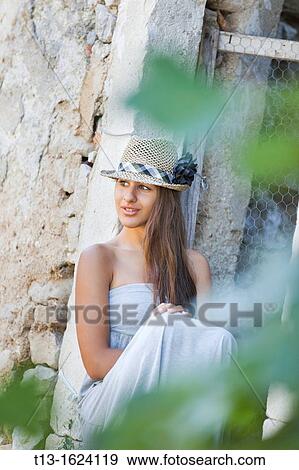 Attractive young woman is resting View Large Photo Image Stock Photo - Attractive young woman is resting. Fotosearch