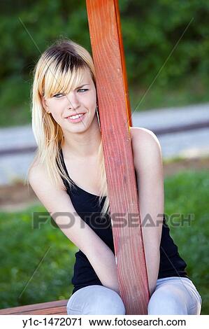 Stock Image - Attractive young woman is suspicions. Fotosearch