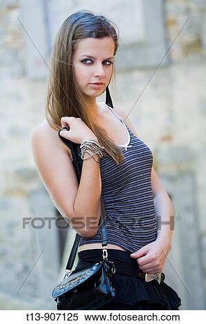 Attractive young woman outdoors View Large Photo Image Stock Photography - Attractive young woman outdoors. Fotosearch