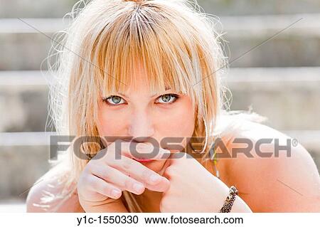 Stock Image - Attractive young woman portrait. Fotosearch