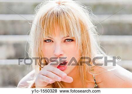 Stock Photo - Attractive young woman portrait. Fotosearch