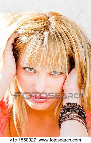 Attractive young woman portrait with a headache View Large Photo Image Stock Photo - Attractive young woman portrait with a headache. Fotosearch