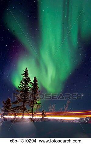 Aurora Borealis Northern Polar Lights over the boreal forest outside Yellowknife, Northwest Territories, Canada View Large Photo Image Picture - Aurora Borealis Northern Polar Lights over the boreal forest outside Yellowknife, Northwest Territories, Canada. Fotosearch