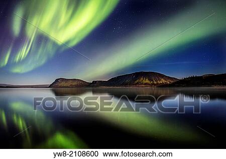 Stock Image - Aurora Borealis or Northern Lights at Lake Thingvallavatn, Thingvellir National Park. Iceland. Thingvellir National Park is a Unesco World Heritage site.. Fotosearch