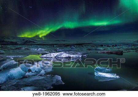 Aurora Borealis or Northern lights at the Jokulsarlon, Breidamerkurjokull, Vatnajokull Ice Cap, Iceland. View Large Photo Image Stock Photography - Aurora Borealis or Northern lights at the Jokulsarlon, Breidamerkurjokull, Vatnajokull Ice Cap, Iceland.. Fotosearch