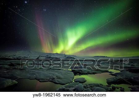 Aurora Borealis or Northern lights at the Jokulsarlon, Breidamerkurjokull, Vatnajokull Ice Cap, Iceland. View Large Photo Image Stock Photography - Aurora Borealis or Northern lights at the Jokulsarlon, Breidamerkurjokull, Vatnajokull Ice Cap, Iceland.. Fotosearch