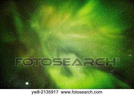 Aurora Borealis or Northern Lights with Milky Way Galaxy, Lapland, Sweden. Cold temperatures as low as -47 celsius. View Large Photo Image Stock Photo - Aurora Borealis or Northern Lights with Milky Way Galaxy, Lapland, Sweden. Cold temperatures as low as -47 celsius.. Fotosearch