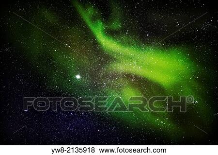 Aurora Borealis or Northern Lights with Milky Way Galaxy, Lapland, Sweden. Cold temperatures as low as -47 celsius. View Large Photo Image Stock Photo - Aurora Borealis or Northern Lights with Milky Way Galaxy, Lapland, Sweden. Cold temperatures as low as -47 celsius.. Fotosearch