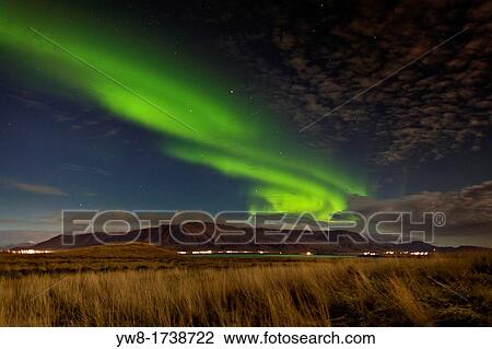 Stock Image - Aurora Borealis over Mt Esja, Reykjavik, Iceland. Fotosearch