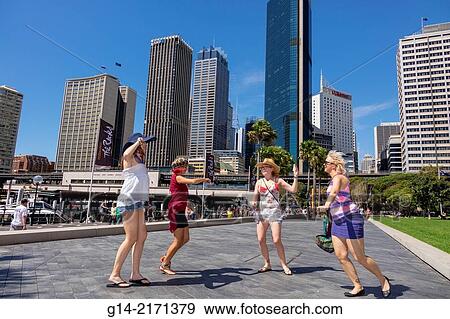 Australia, NSW, New South Wales, Sydney, West Circular Quay, Sydney Harbour, harbor, CBD, Central Business District, skyscrapers, city skyline, woman, friends, dancing,. View Large Photo Image Stock Photo - Australia, NSW, New South Wales, Sydney, West Circular Quay, Sydney Harbour, harbor, CBD, Central Business District, skyscrapers, city skyline, woman, friends, dancing,.. Fotosearch
