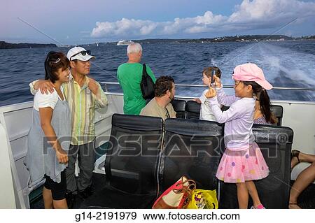 Australia, NSW, New South Wales, Sydney, Sydney Harbour, harbor, Watsons Bay, Sydney Ferries, onboard, ferry, public transportation, Asian, man, father, woman, mother, girl, daughter, posing, taking, picture, passengers. View Large Photo Image Stock Photo - Australia, NSW, New South Wales, Sydney, Sydney Harbour, harbor, Watsons Bay, Sydney Ferries, onboard, ferry, public transportation, Asian, man, father, woman, mother, girl, daughter, posing, taking, picture, passengers.. Fotosearch