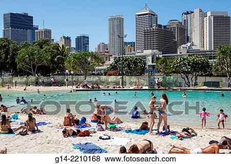 Australia, Queensland, Brisbane, South Bank Parklands, Streets Beach, sunbathers, sand, water, Central, Business, District, CBD, city skyline, skyscrapers, buildings. View Large Photo Image Stock Photo - Australia, Queensland, Brisbane, South Bank Parklands, Streets Beach, sunbathers, sand, water, Central, Business, District, CBD, city skyline, skyscrapers, buildings.. Fotosearch