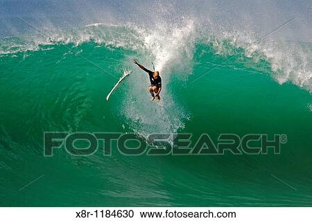 Stock Image - Australia's Mick Fanning wipes out on a wave during a warm up session at Hossegor in the south west coast of France. Fotosearch