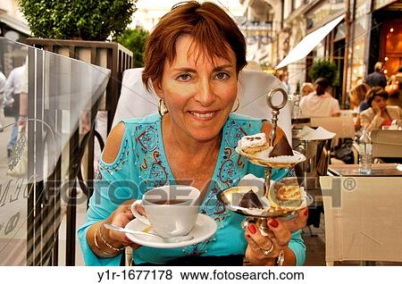 Austria, Vienna, Enjoying tea and pasries at the Demel Cafe model release View Large Photo Image Stock Photo - Austria, Vienna, Enjoying tea and pasries at the Demel Cafe model release. Fotosearch