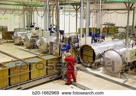 Stock Photo - Autoclave sterilization in hermetically sealed containers by the method Appert, Appertization, Production line of canned vegetables and beans, Canning Industry, Agri-food, Gutarra, Grupo Riberebro, Villafranca, Navarra, Spain. Fotosearch