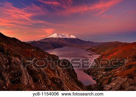 Autumn sunrise over Mt St Helens volcano which erupted in 1980, and created almost moon like landscape to which life is slowly finding it's way back View Large Photo Image Stock Photograph - Autumn sunrise over Mt St Helens volcano which erupted in 1980, and created almost moon like landscape to which life is slowly finding it's way back. Fotosearch