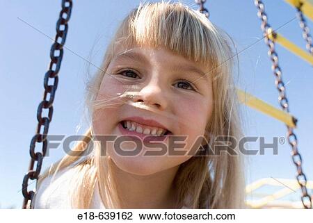 Ava at the playground. 4 year old girl. White Rock, BC Canada View Large Photo Image Stock Image - Ava at the playground. 4 year old girl. White Rock, BC Canada. Fotosearch