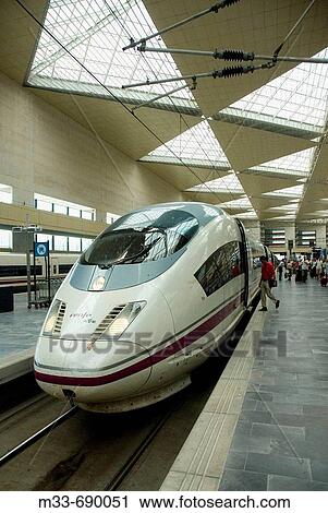 Stock Image - AVE (Spanish High-speed train), model Siemens Serie 103. Zaragoza-Delicias station, Zaragoza, Aragon, Spain. Fotosearch