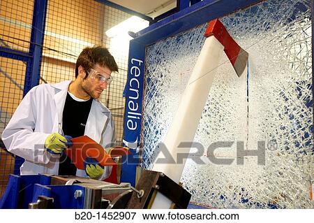 Stock Photo - Axe impact to determinate resistance and rupture point of safety glasses, material homologation, Technology Research Center, Tecnalia Construction, CIDEMCO-Tecnalia Research & Innovation, development of new products and innovative solutions. Fotosearch